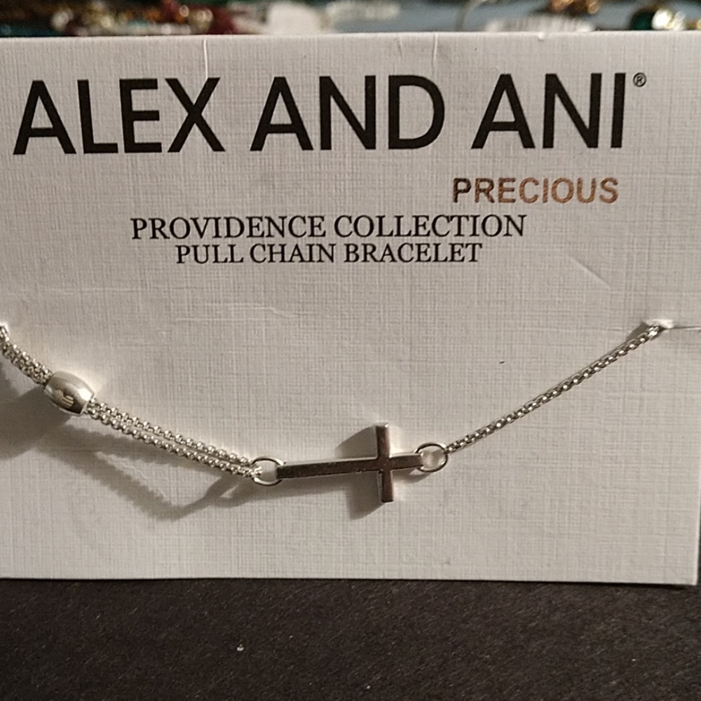 ALEX AND ANI 2015 RETIRED SS CROSS PULL STRING NWT